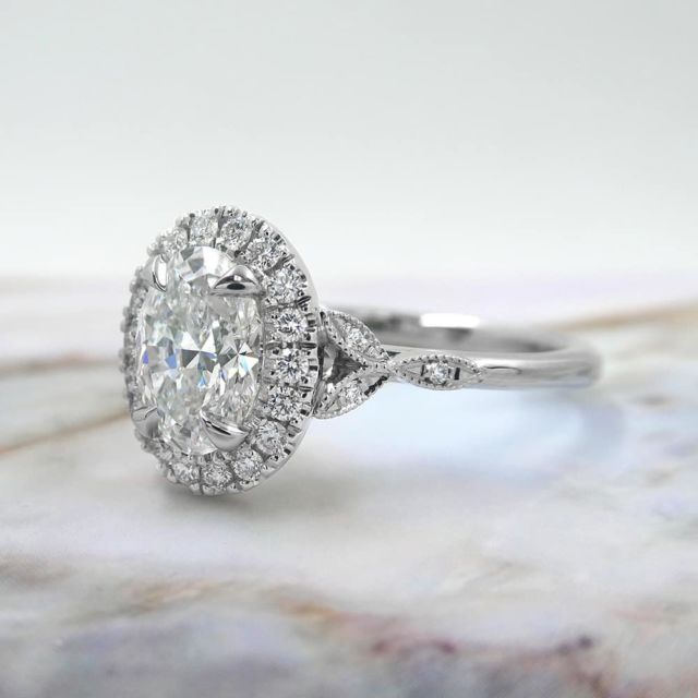 Kimberfire oval halo engagement ring