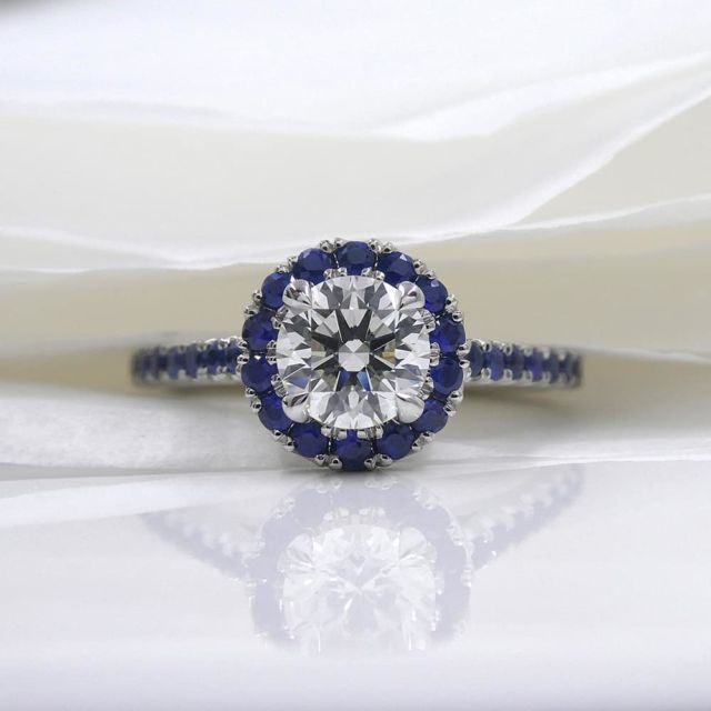 Kimberfire round diamond blue sapphire halo and pave engagement ring