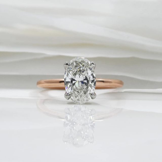 Kimberfire oval solitaire engagement ring