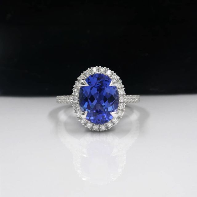 Kimberfire oval sapphire halo engagement ring
