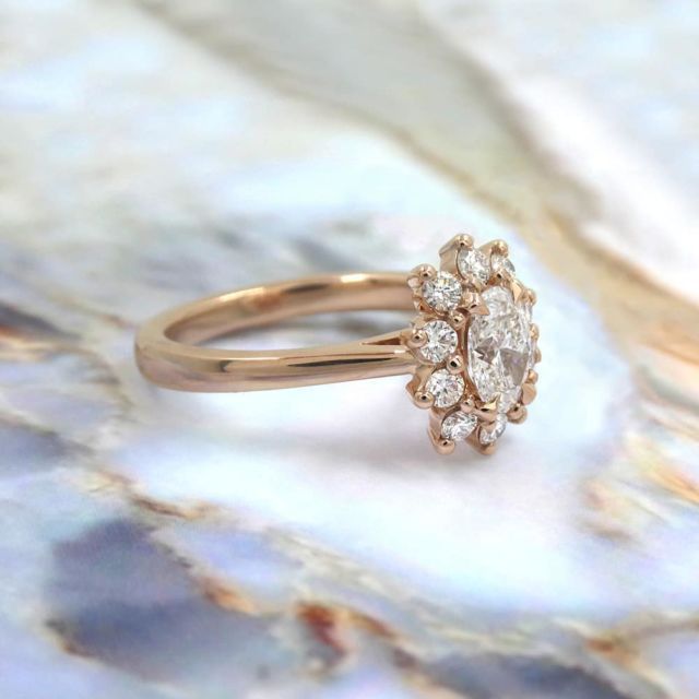 Kimberfire oval halo rose gold engagement ring