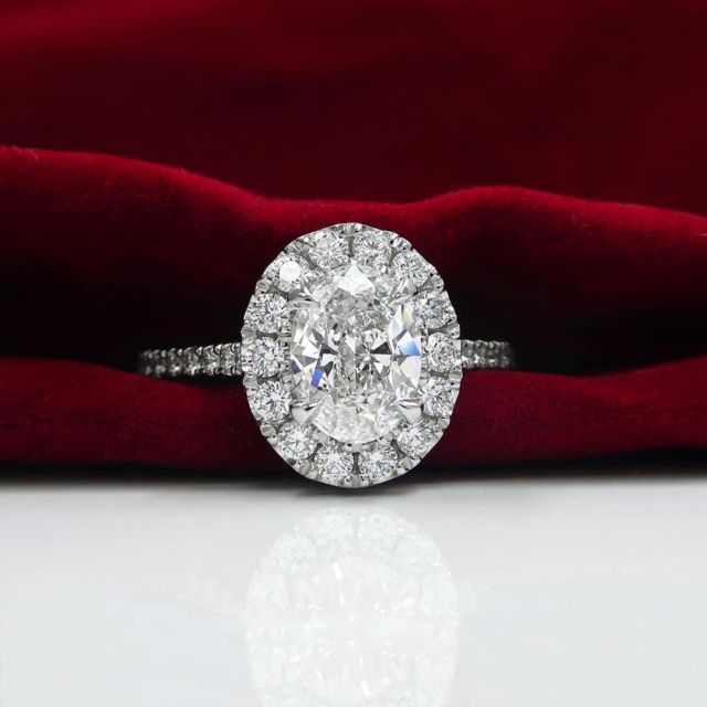 Kimberfire oval halo engagement ring