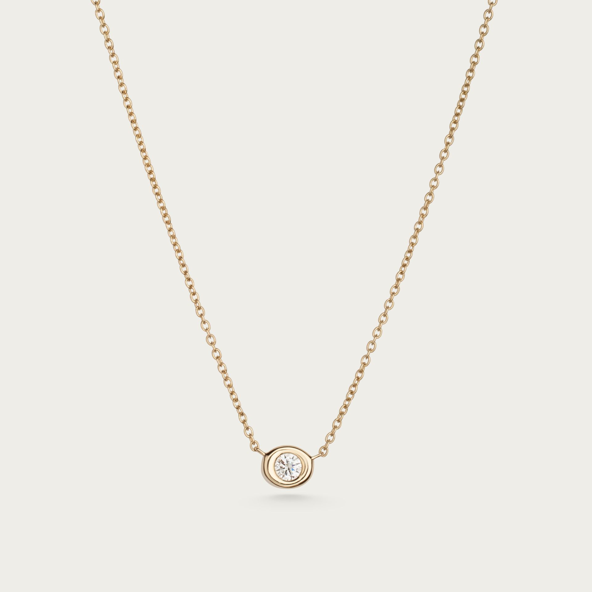 Kimberfire Pebble necklace in yellow gold.