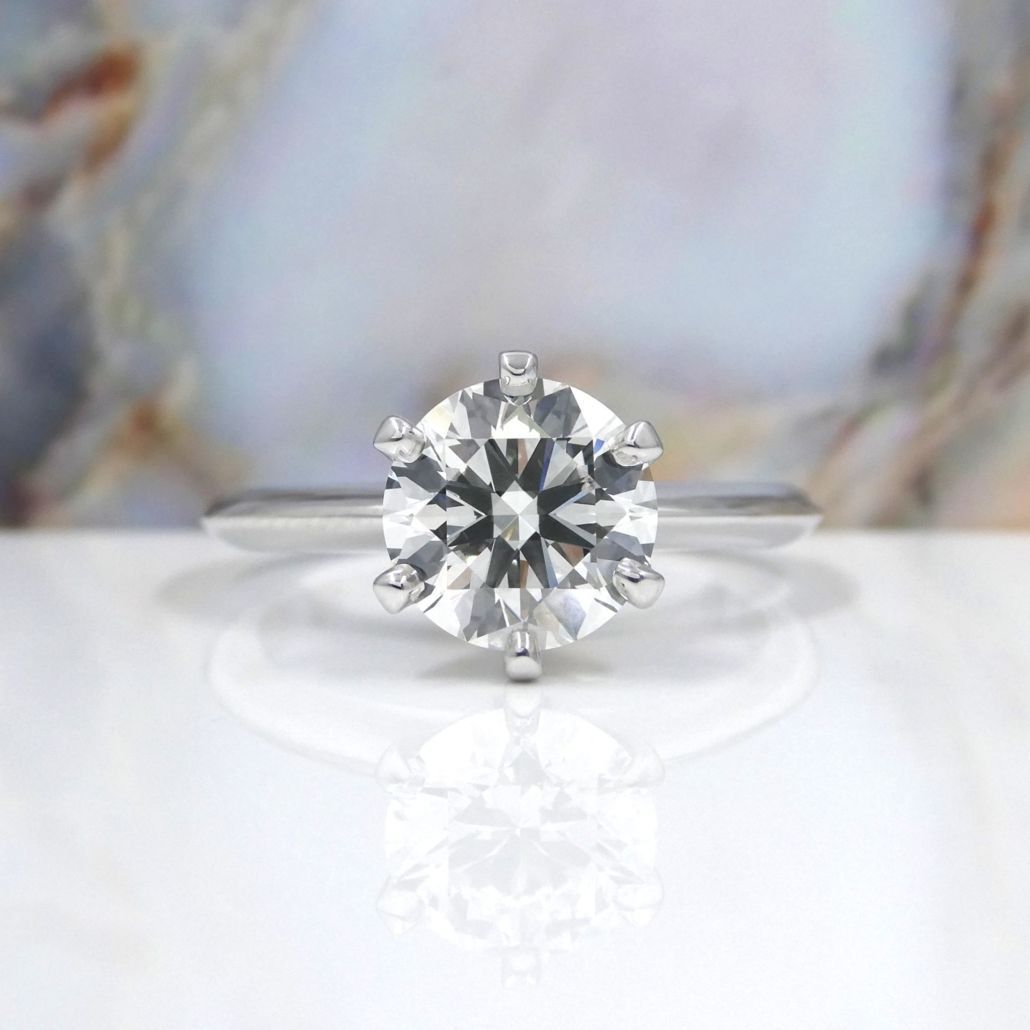 Kimberfire six prong solitaire custom engagement ring.