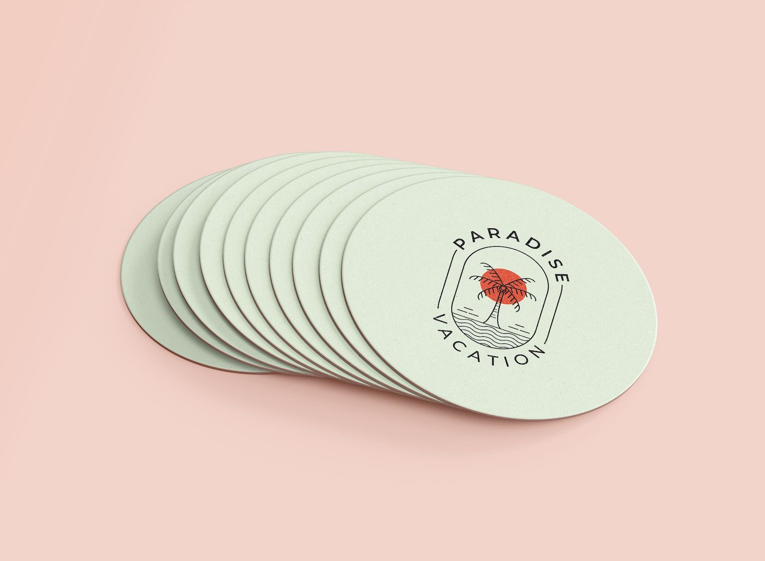 A bunch of coasters are stacked on top of each other on a pink surface.