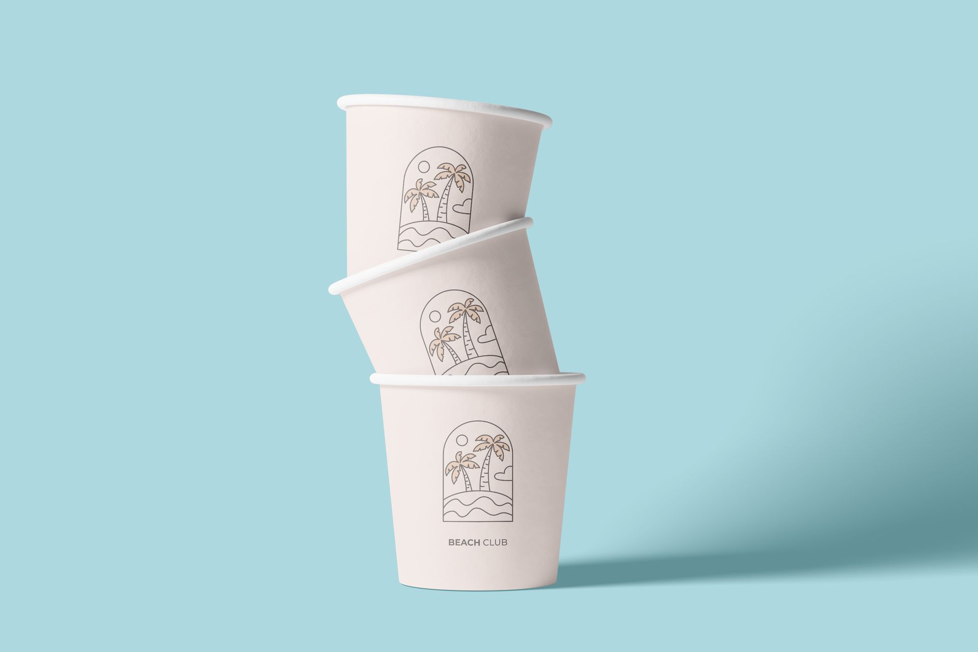 Three paper cups are stacked on top of each other on a blue background.