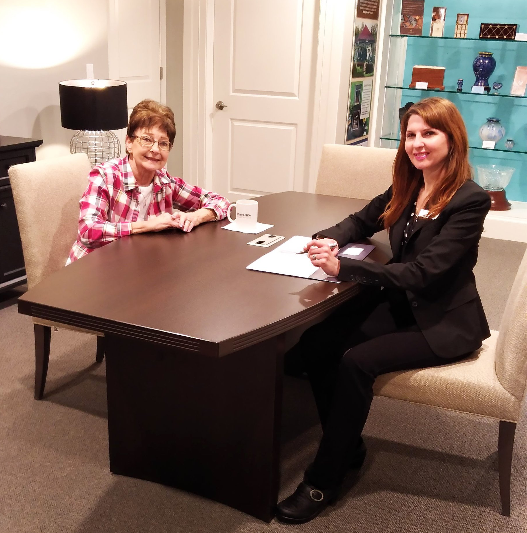 preplanning specialist kelly teague explains the benefit to a client