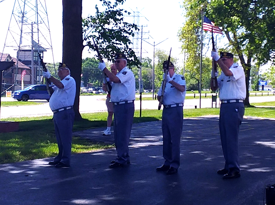 American Legion 461 members rifle salute to retire warn US flags