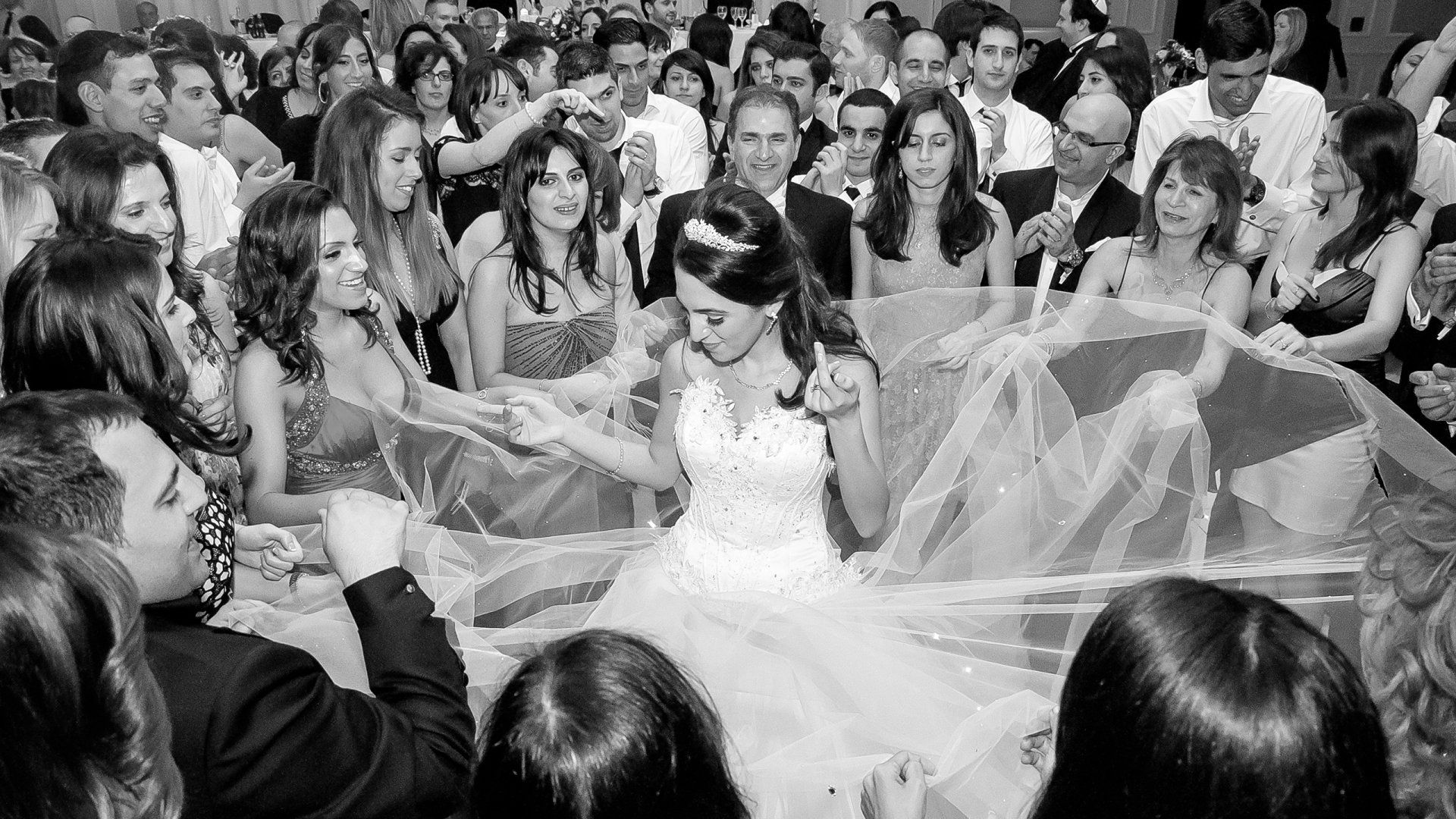 Jewish Sephardi custom to open the Brides dress on the dance floor