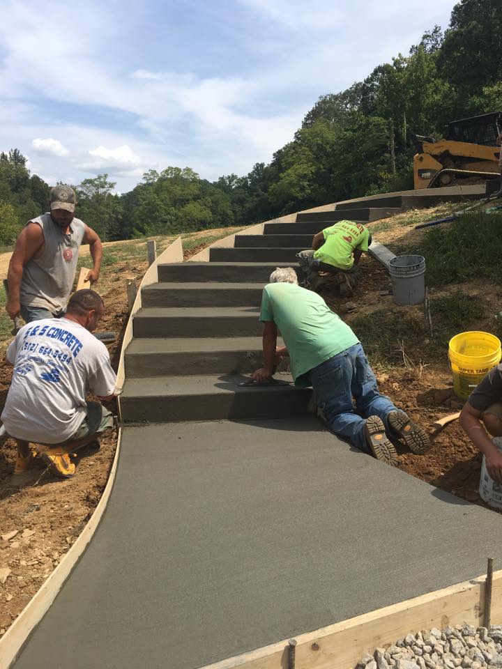 Worker Installing Stairway | Louisville, KY | S & S Concrete Inc.
