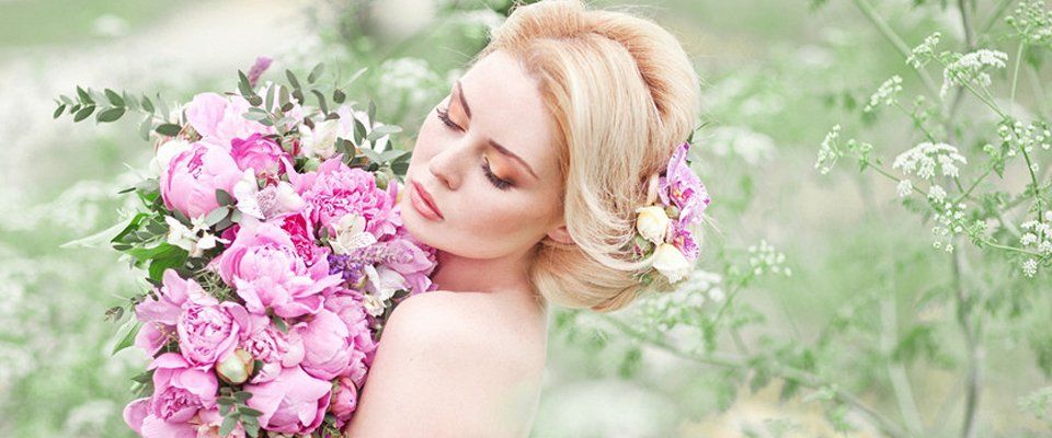 a lady holding flowers