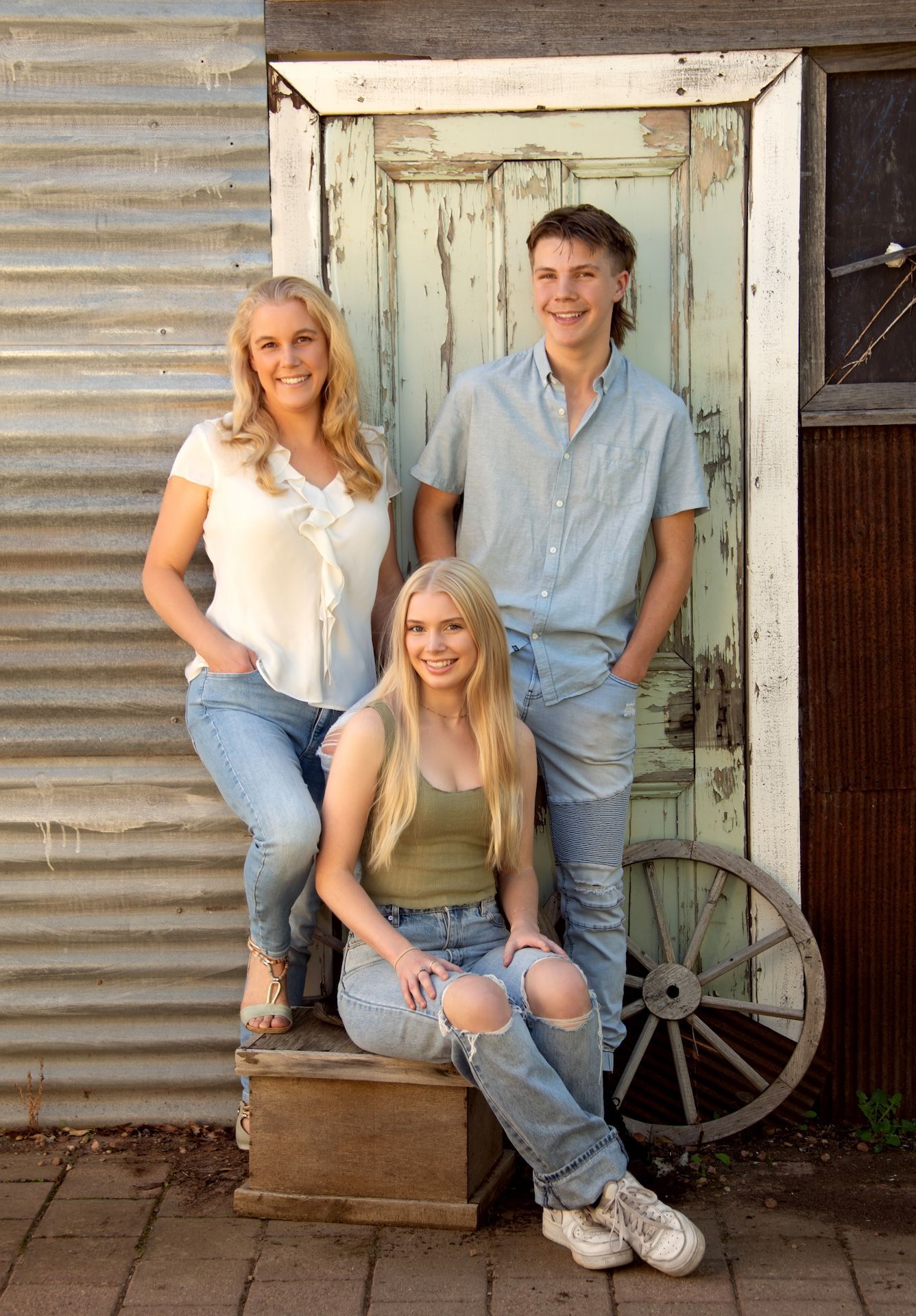 A Man is Holding a Baby in His Arms in a Black and White Photo — Dale Wright Portrait Maker in Shepparton, VIC