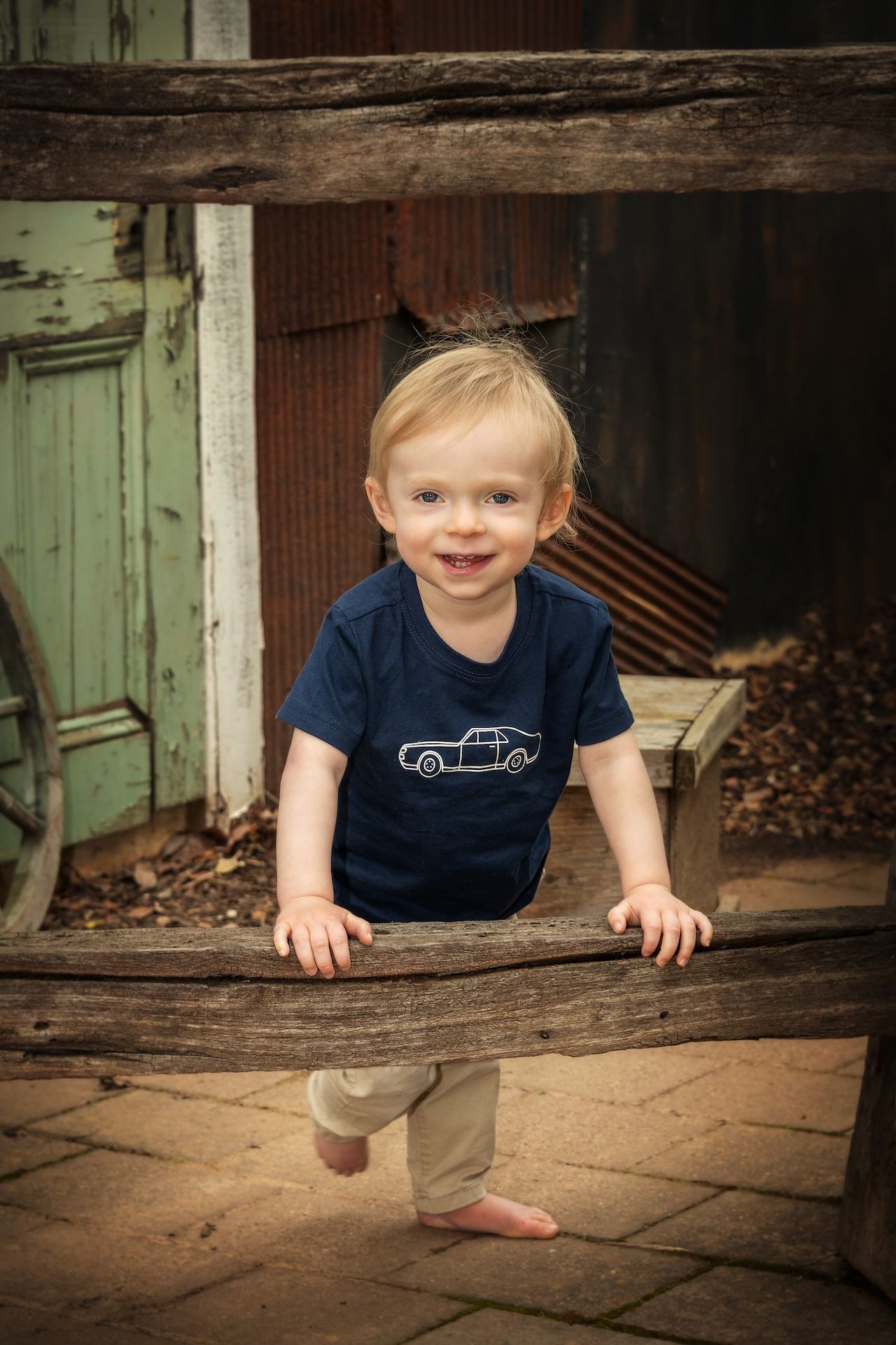 A Little Boy Wearing a Hat and a Sweater With a Cat on It — Dale Wright Portrait Maker in Shepparton, VIC