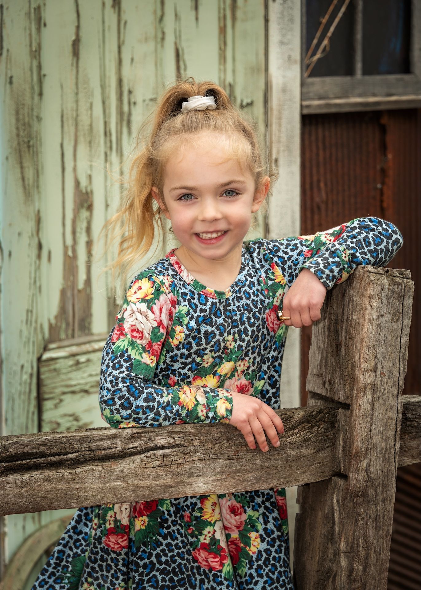 A Young Woman With Long Hair is Wearing a Black Shirt and Choker — Dale Wright Portrait Maker in Shepparton, VIC