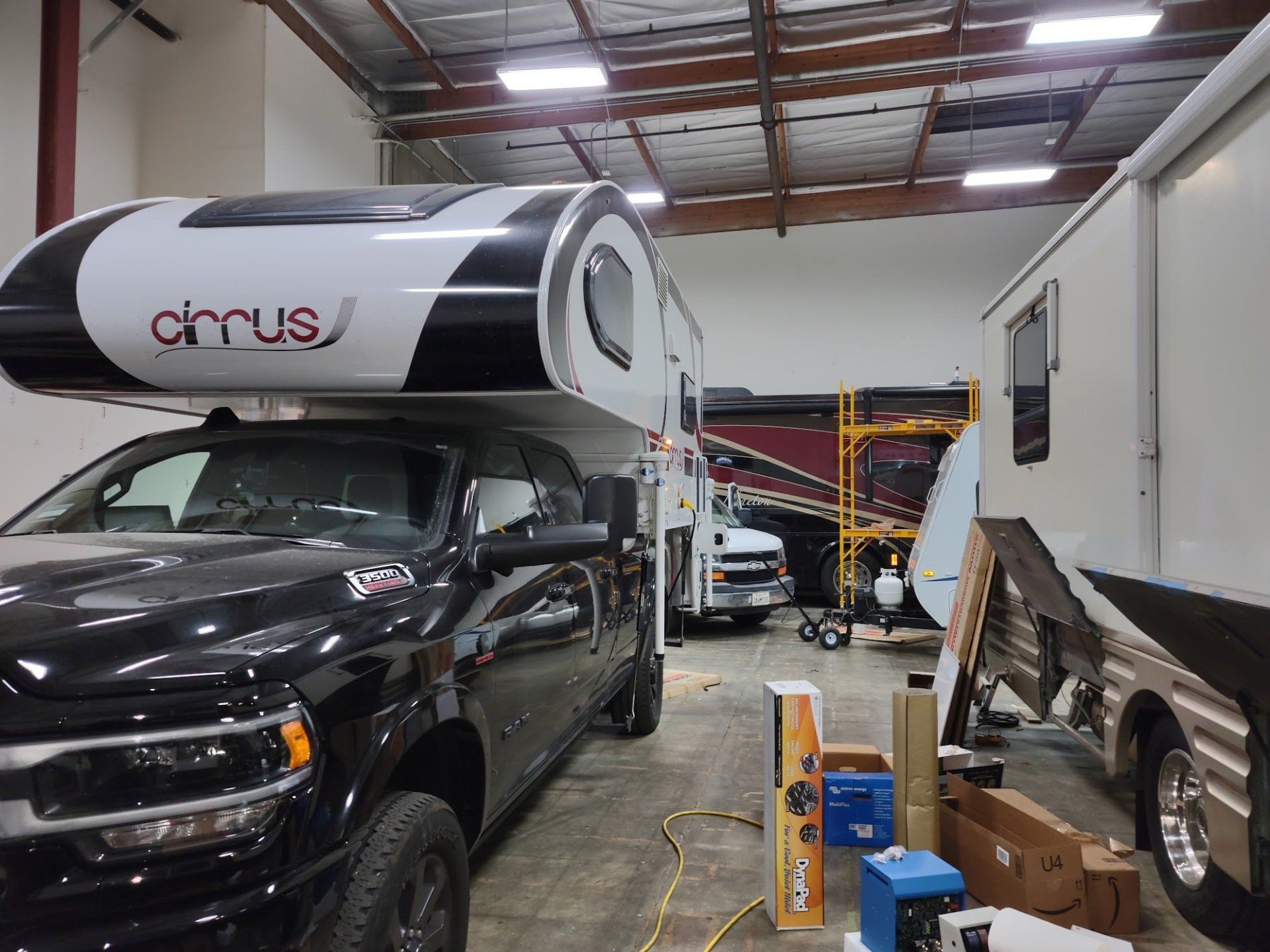 A Cirrus RV parked at our shop