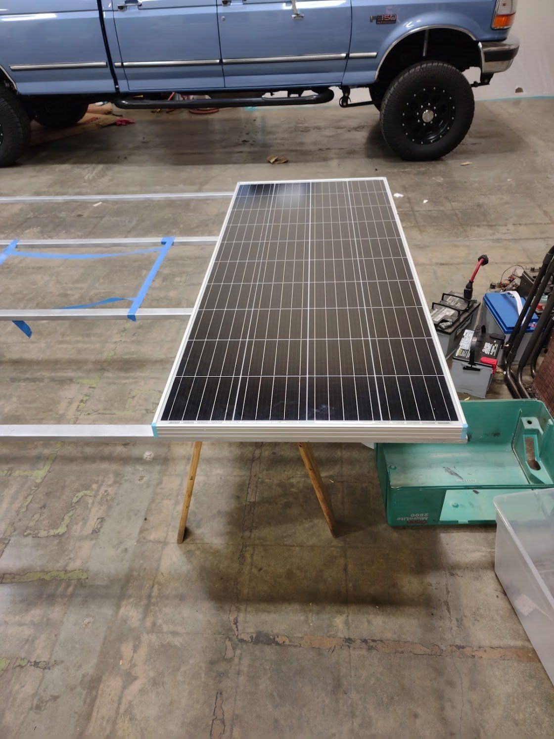 A rack of solar panels being built