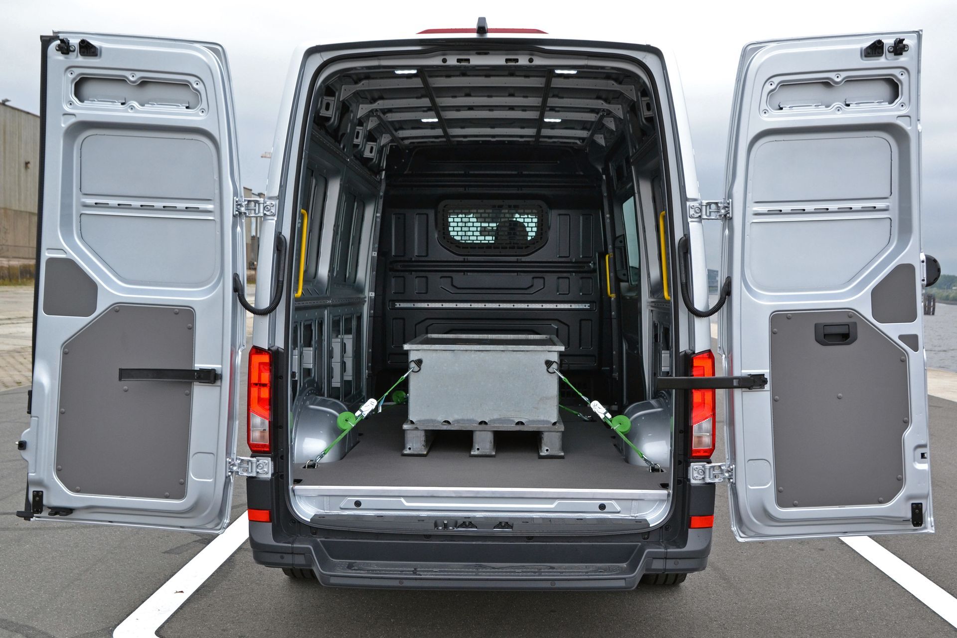 Man Holding A Box — Kaneohe, HI — Lucky’s Delivery & Moving Services