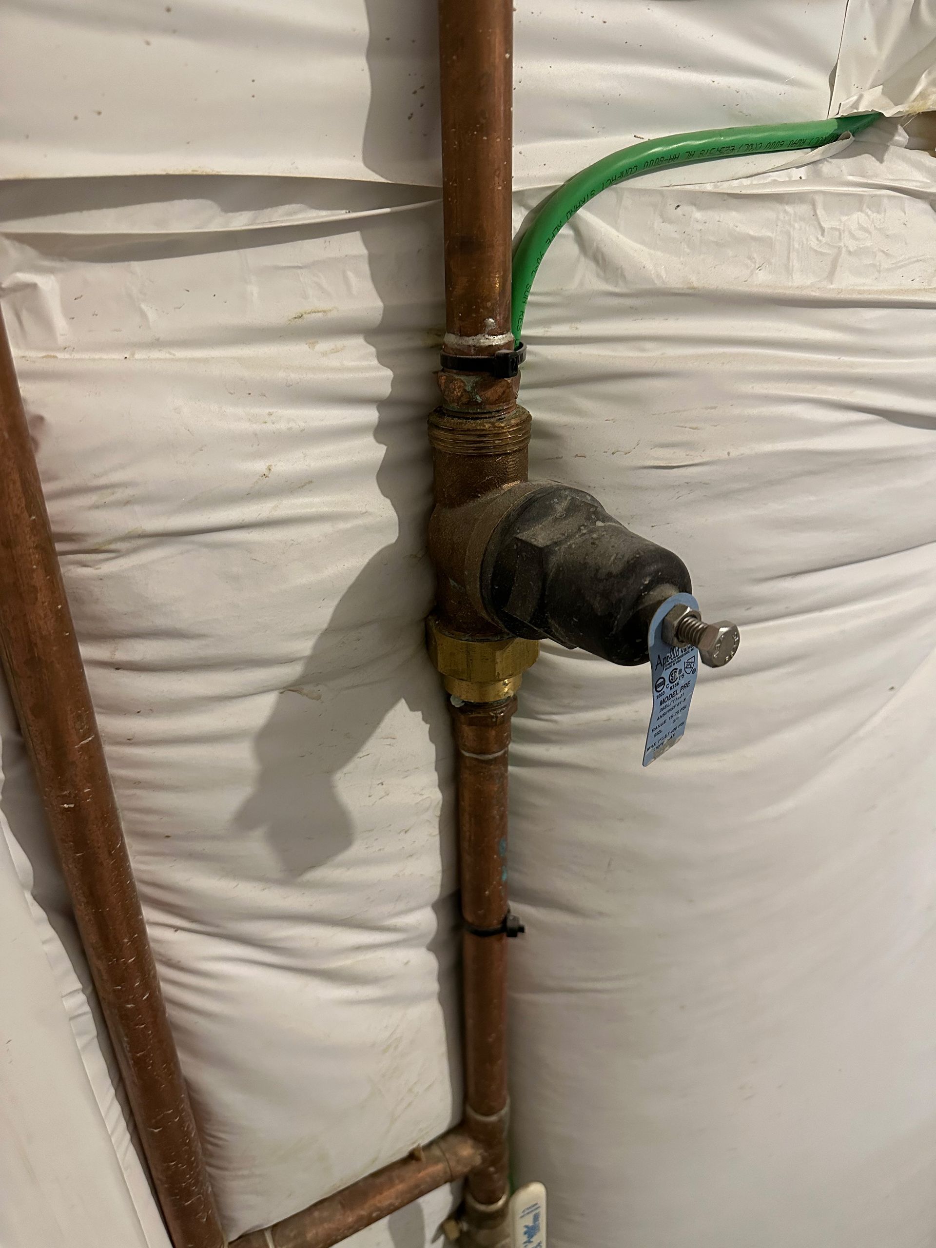 Water pressure regulator valve installation.