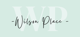 The logo for wilson place is written in cursive on a light blue background.