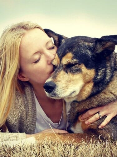Kissing Pet Dog - Animal Health Care Clinic in Omaha, NE