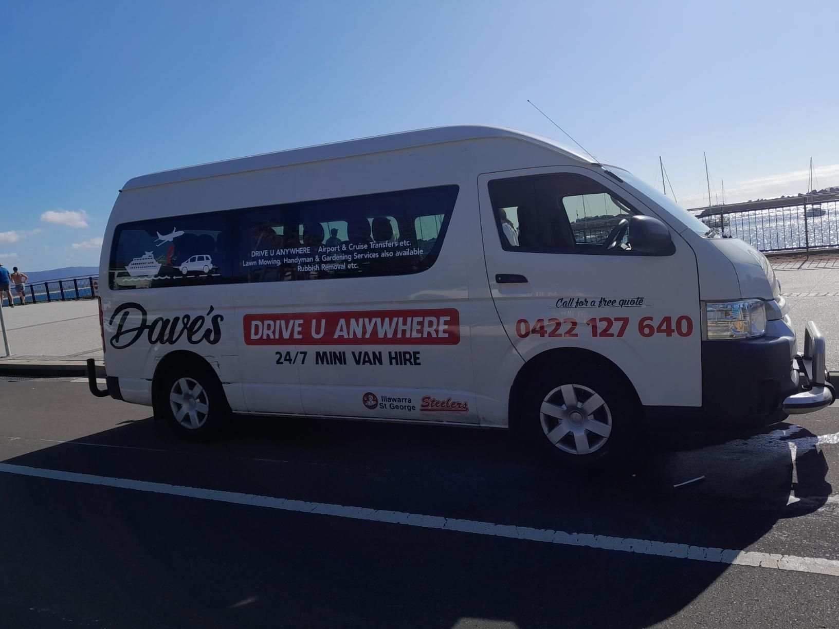 White Dave's Drive U Anywhere Van Parked Outdoors — Dave's Drive U Anywhere 24/7 Mini Van Hire In Bulli, NSW