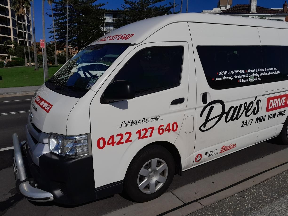 White Van With Dave's Drive U Anywhere Logo and Phone Number Parked on Street — Dave's Drive U Anywhere 24/7 Mini Van Hire In Dapto, NSW