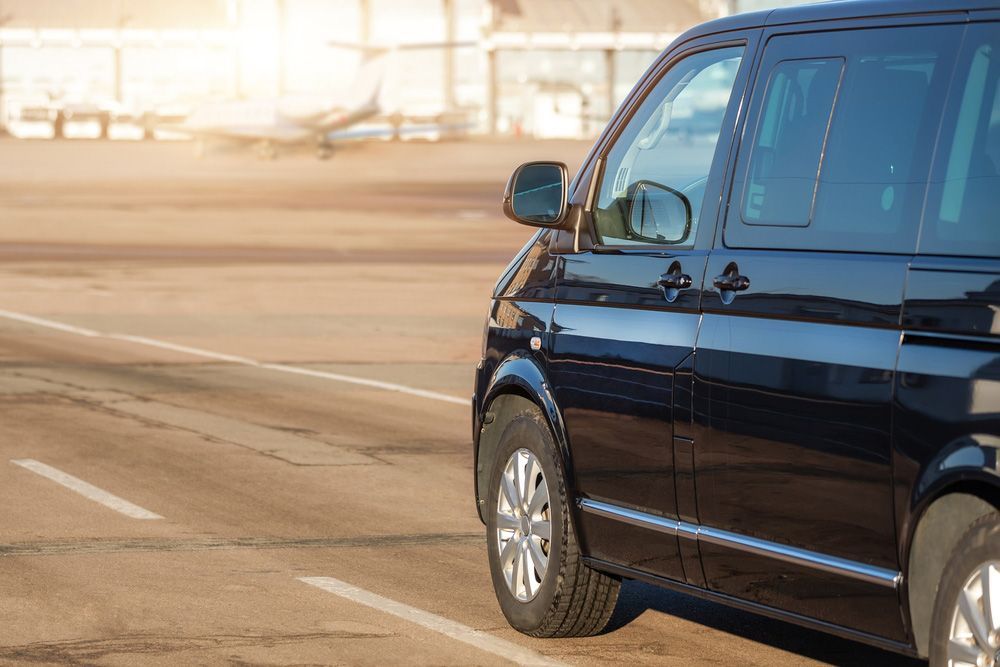 Black Passenger Van Parked — Dave's Drive U Anywhere 24/7 Mini Van Hire In Shellharbour, NSW