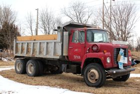 Dump truck for hauling sand, gravel, and topsoil