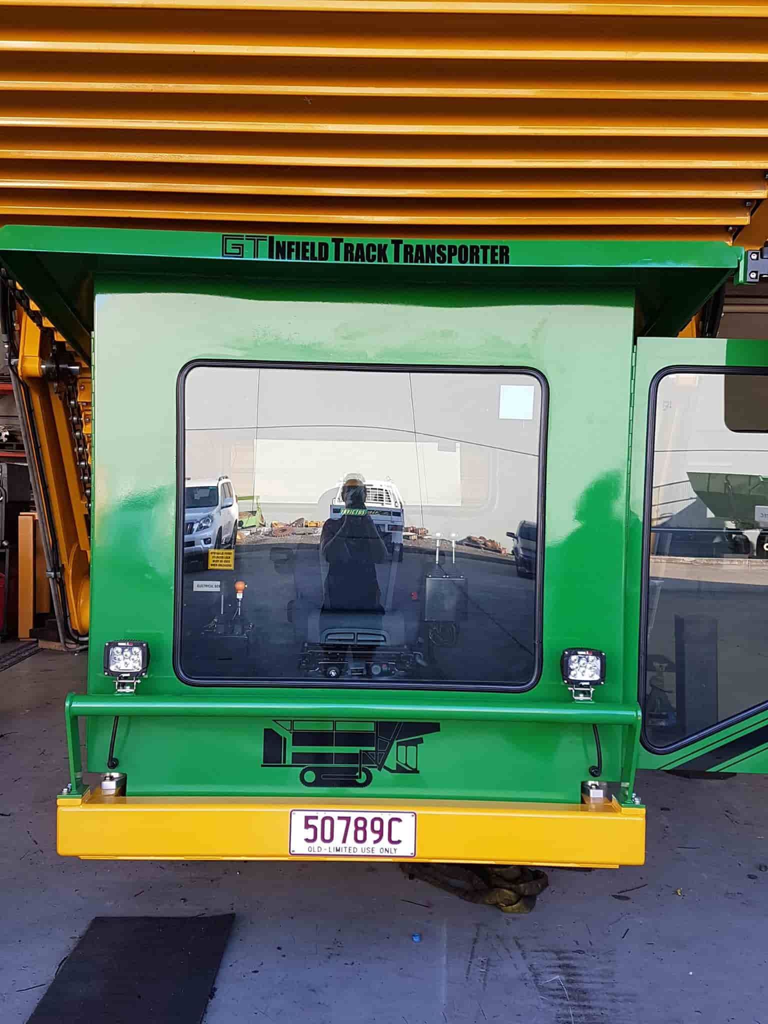 A Green And Yellow Vehicle With A License Plate That Says 50739c — Sun City Signs In Dysart, QLD