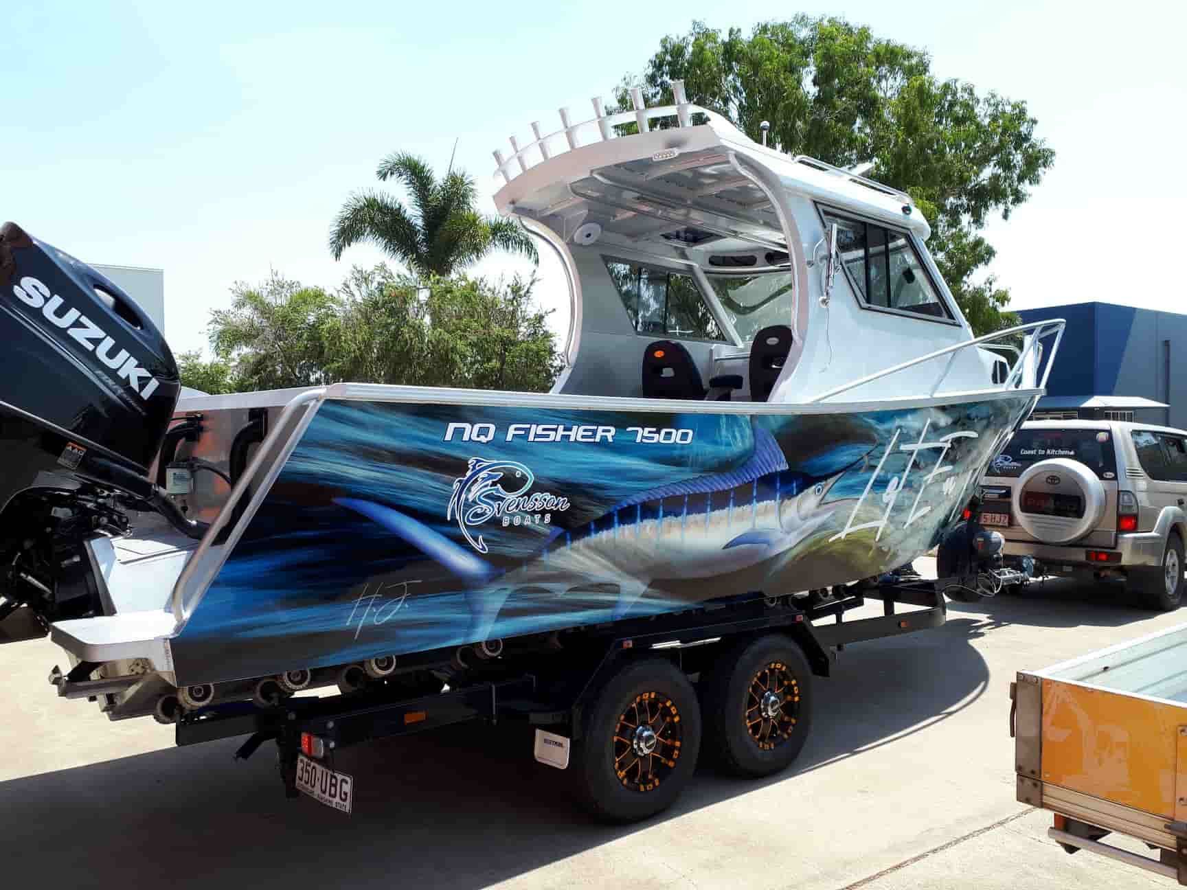 A Suzuki Boat Is Parked On The Side Of The Road — Sun City Signs In Moranbah, QLD