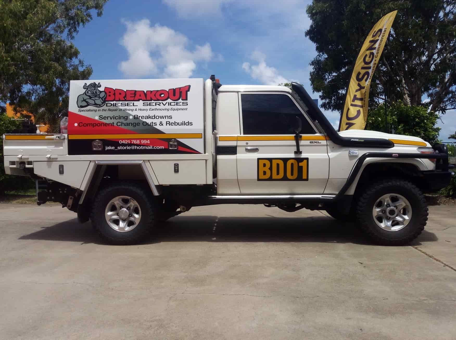 A White Truck With The Number Bd01 On The Side — Sun City Signs In Paget, QLD