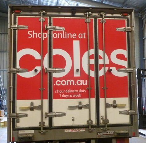 A Truck That Says Shop Online At Coles.com.au — Sun City Signs In Paget, QLD