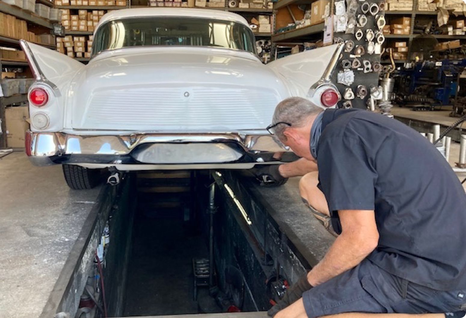 A Technician is Checking a Car's Muffler in Spring Valley, CA | Ed Hanson's Muffler Service