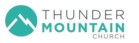 The logo for thunder mountain church shows a mountain with a lightning bolt on it.