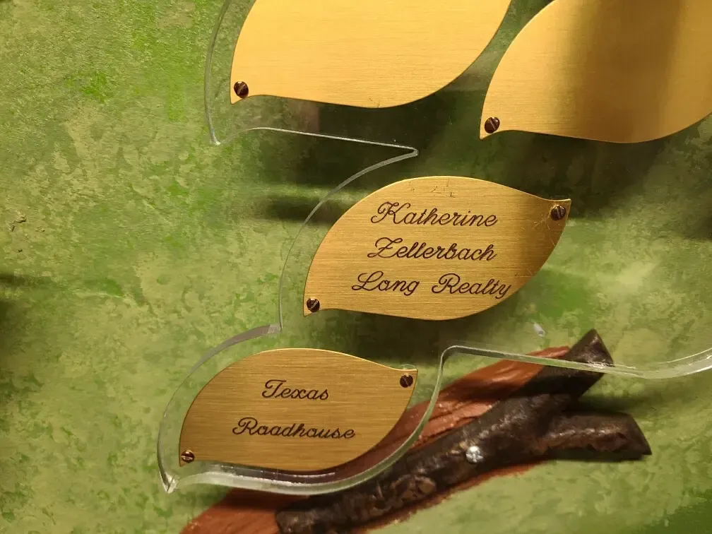 A tree with leaves made of acrylic and wood