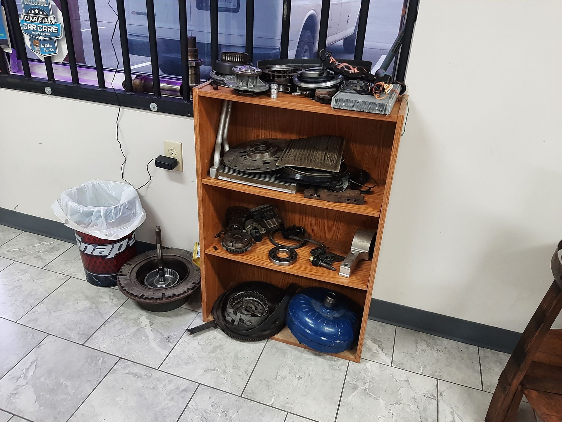 Shelf Displaying Used Auto Parts and Transmission Components | Tex's Transmissions Complete Auto & Truck Care