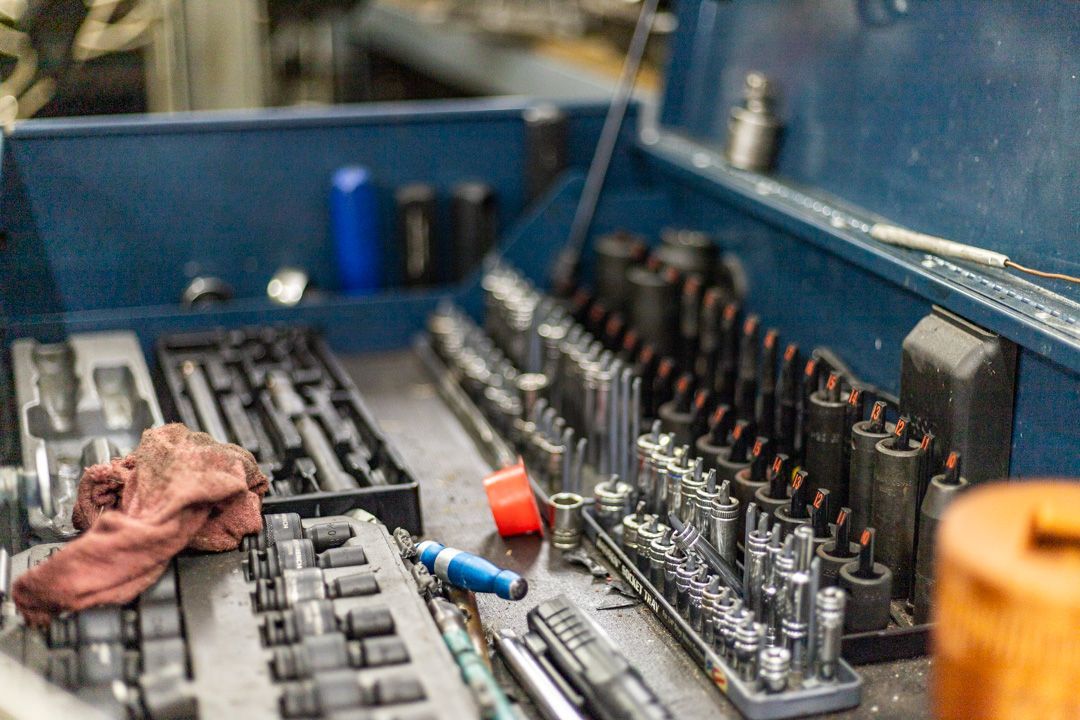 Close-Up of Tool Tray with Sockets, Wrenches, and Rag | Tex's Transmissions Complete Auto & Truck Care