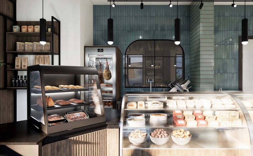 Une boulangerie avec une vitrine remplie de beaucoup de nourriture.