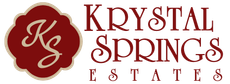 Krystal Springs Estates logo with burgundy emblem and text on white background