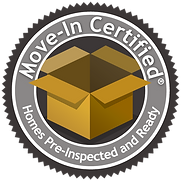 A seal that says `` move-in certified homes pre- inspected and ready '' with a cardboard box in the center.