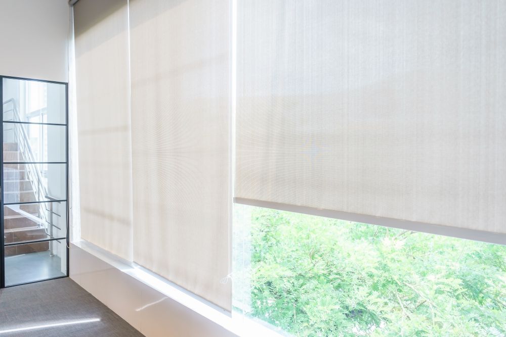 A Room With a Large Window and Blinds on It — Curtain Haven & Blinds in Lake Cathie, NSW