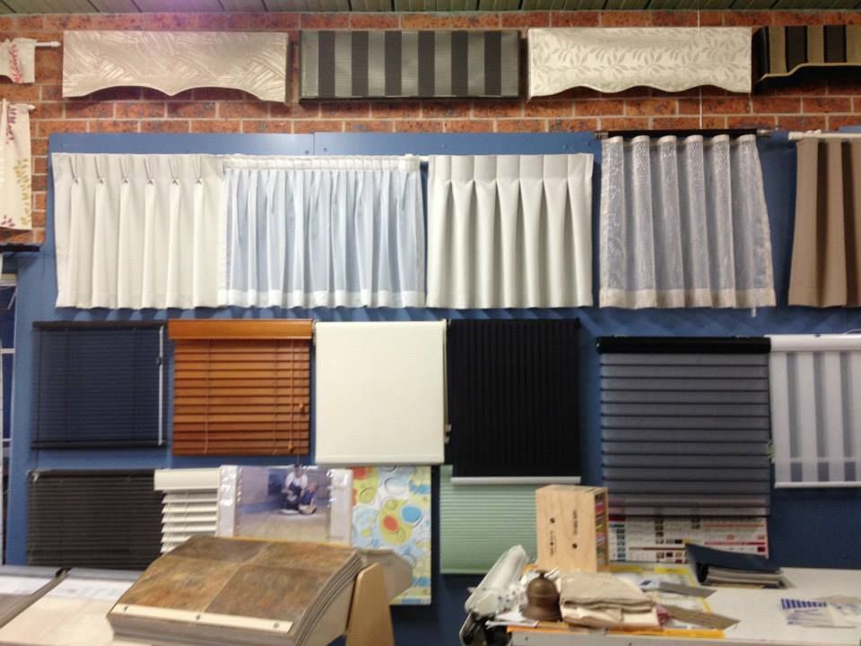 A Display of Blinds and Curtains in a Store — Curtain Haven & Blinds in Laurieton, NSW