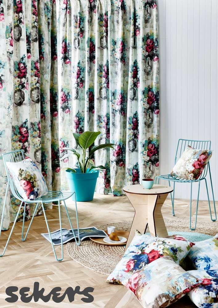 A Living Room With a Table, Chairs, Pillows and Curtains — Curtain Haven & Blinds in Laurieton, NSW
