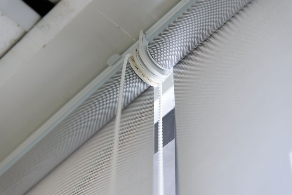 A Close Up of a Blind With a String Attached to It — Curtain Haven & Blinds in Laurieton, NSW