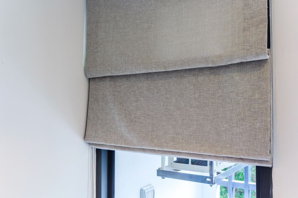 A Close Up of a Window With a Blind on It — Curtain Haven & Blinds in Laurieton, NSW