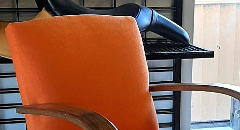 orange upholstery on chair