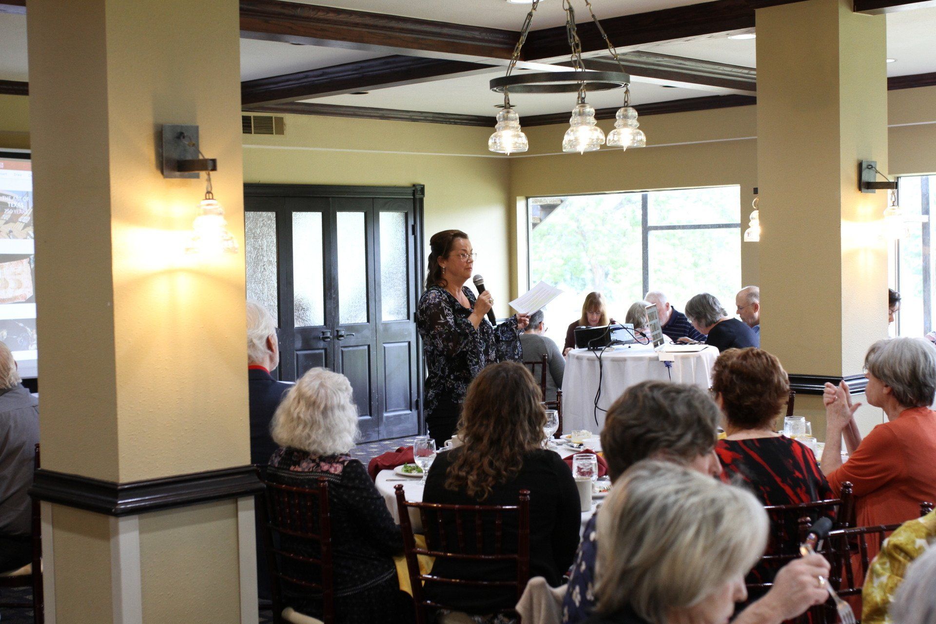 Brigitte Kimichik addressing audience during media event on workplace respect and leadership