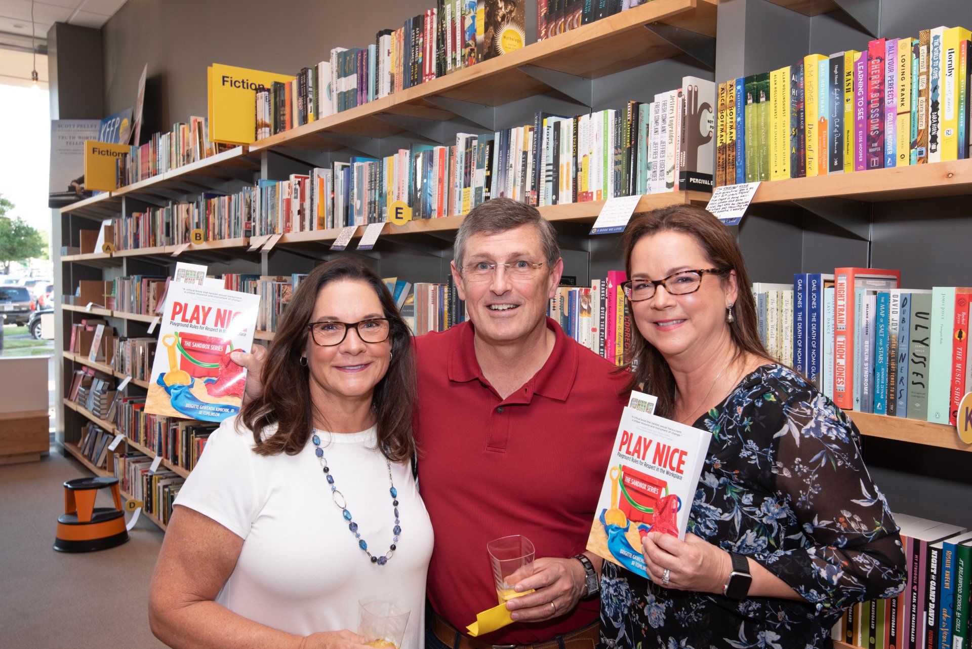 Attendees engaging with Play Nice authors at workplace inclusion and allyship event