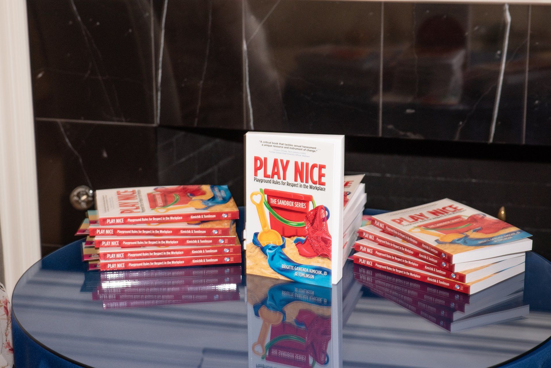 Display of Play Nice at event promoting workplace respect and allyship