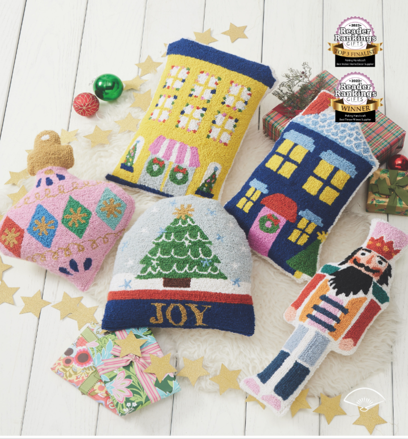 A christmas pillow with the word joy on it